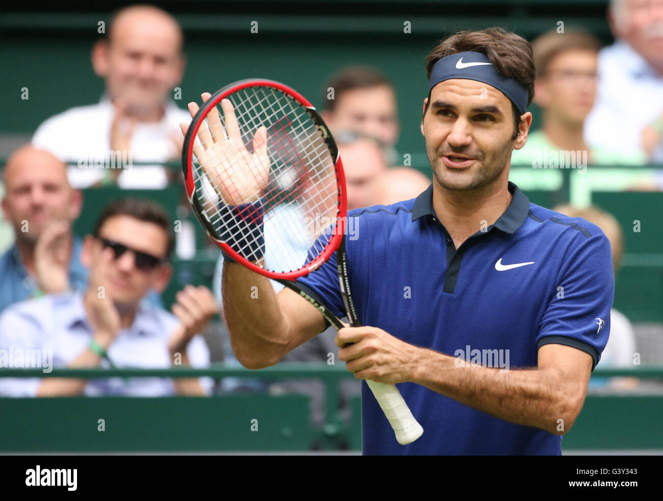 Halle, Germany. 16th June, 2016. Roger Federer of Switzerland waves after  his victory in the match against M. Jaziri of Tunisia during the ATP tennis  tournament in Halle, Germany, 16 June 2016.