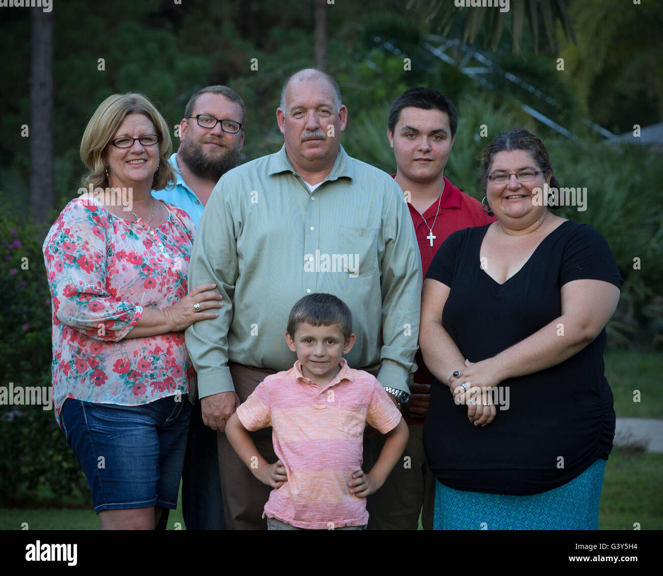 Jupiter, Florida, USA. 16th June, 2016. Gary Weidenhamer (center) stands behind his grandson, Bradley, 5, named after his son who was killed by a gator on the Loxahatchee River in 1993. (l to r) Wife, Donna, son, Brent, grandson, Justin, 14, and daughter-in-law, Leaha Weidenhamer.''The hardest part is a few weeks later, when everyone else's lives go back to normal. Your's doesn't.'' says Gary Weidenhamer. The Weidenhamer's know because their 10-year-old son Bradley died in the grips of a gator that attacked on the Loxahatchee River in Jupiter on June 19, 1993. (Credit Image: © Allen Eyeston Stock Photo