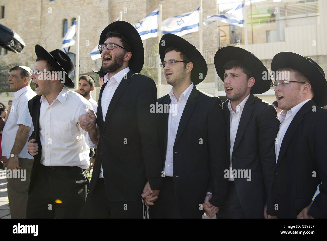 Jerusalem, Israel, Israel. 16th June, 2016. The Masorti Movement is a jewish-conservative religious group blocks prayer. Dozens of young ultra-Orthodox men shoved, shouted and spat at Reform and Conservative Jewish worshippers who held a government-sanctioned mixed-gender prayer service in the Western Wall's public plaza. Credit:  Danielle Shitrit/ZUMA Wire/Alamy Live News Stock Photo