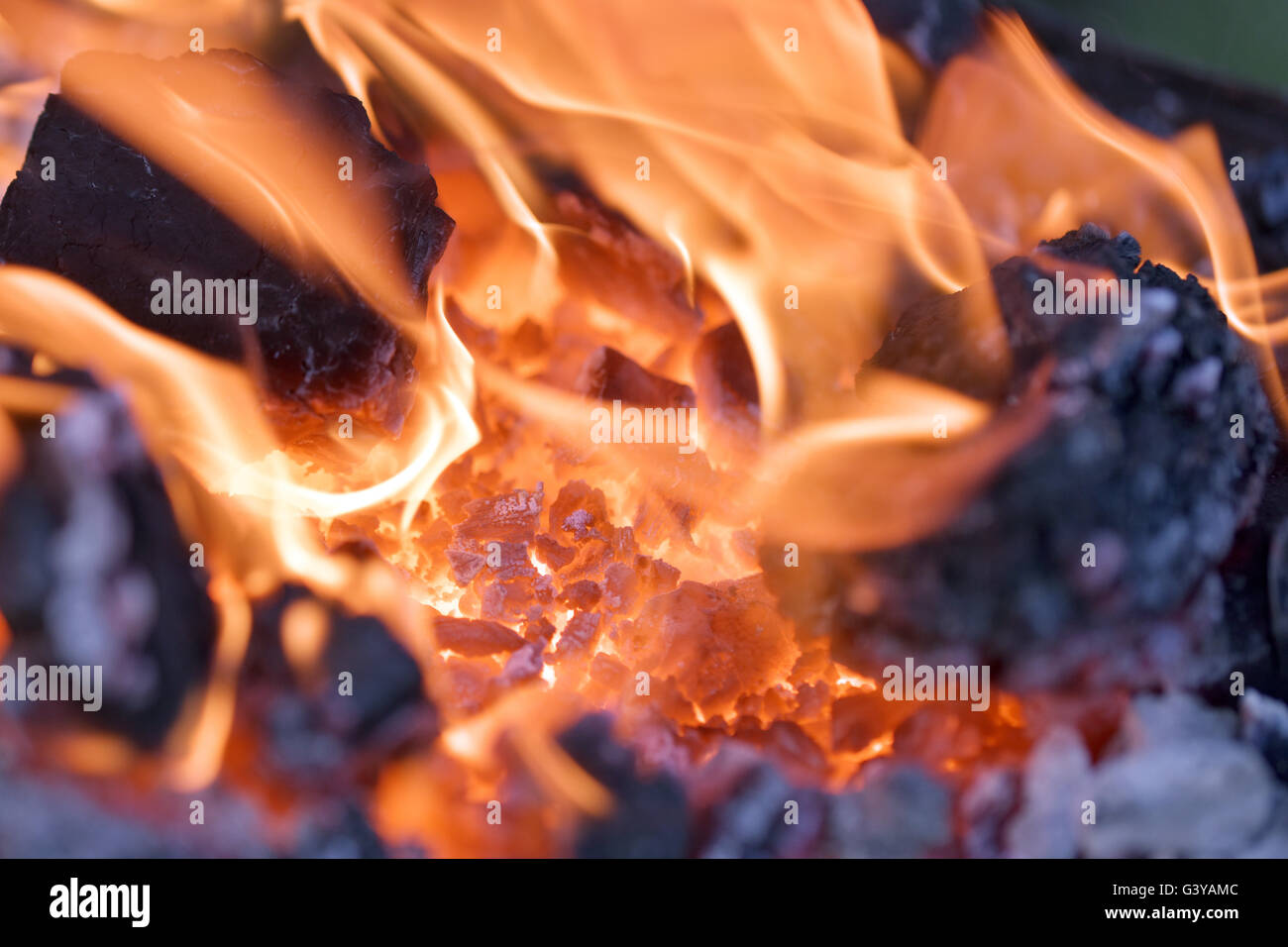 Flames and glowing embers in the hearth of a blacksmith Stock Photo Alamy