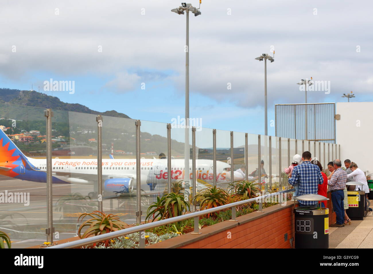 Spectators on the visitors' platform at the terminal at Funchal Airport, Madeira, Portugal Stock Photo
