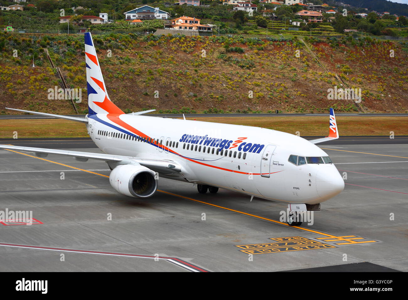 Smart Wings Boeing 737-800(WL) OM-TSG arriving at the Gate at Funchal  Airport, Madeira, Portugal Stock Photo - Alamy