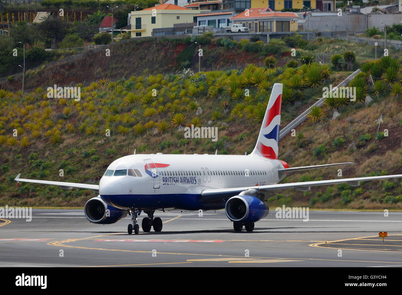 British Airways Airbus A320-200 G-GATJ arriving at Funchal Airport, Madeira, Portugal Stock Photo