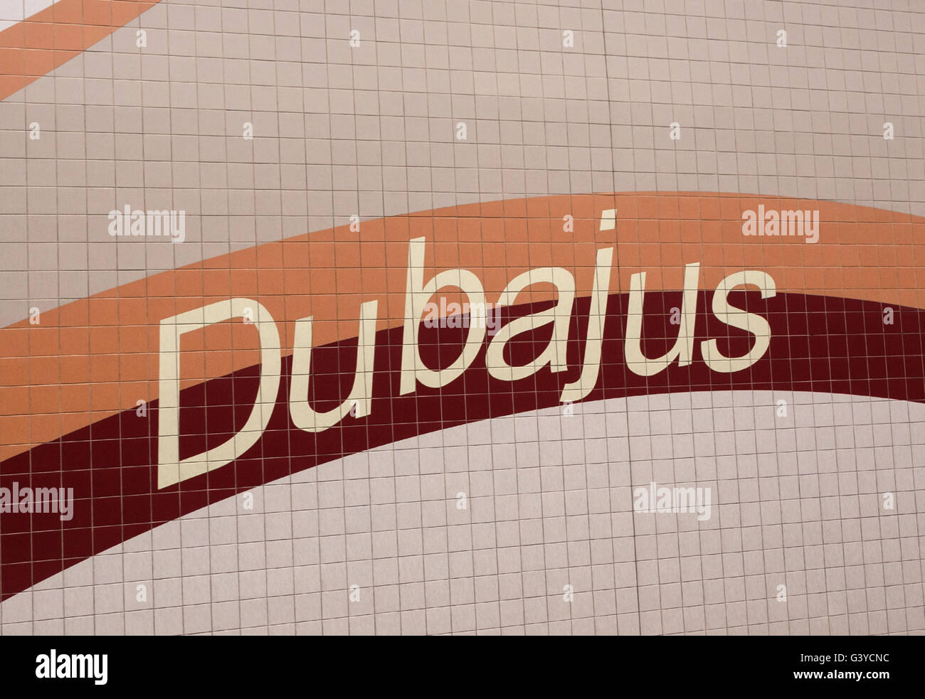 inscription Dubai in Lithuanian on the wall Stock Photo