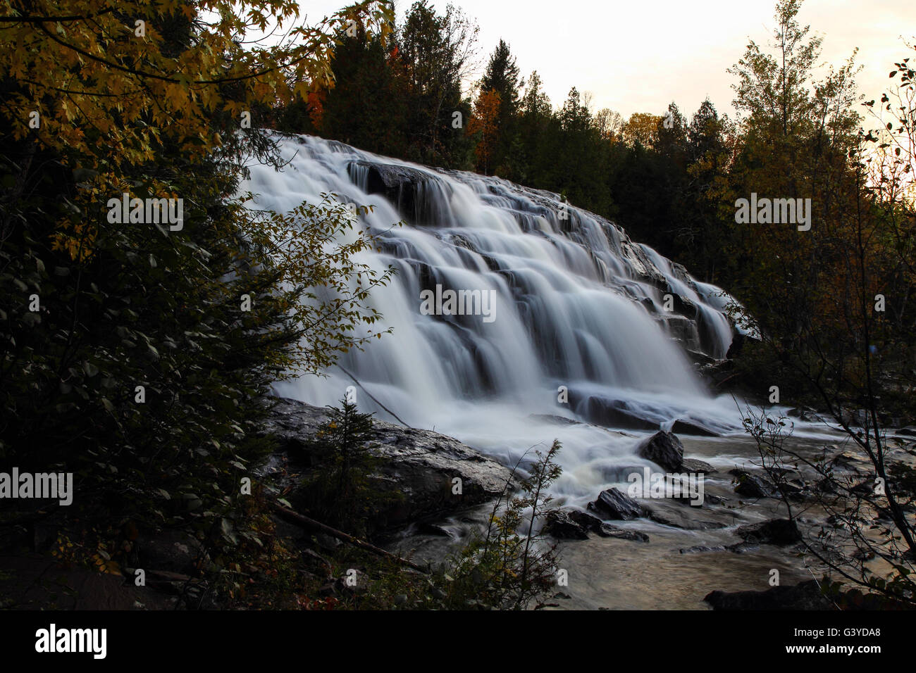 Michigan's Bond Falls Panorama. Beautiful Bond Falls in Michigan's Upper Peninsula surrounded by autumn foliage. Stock Photo