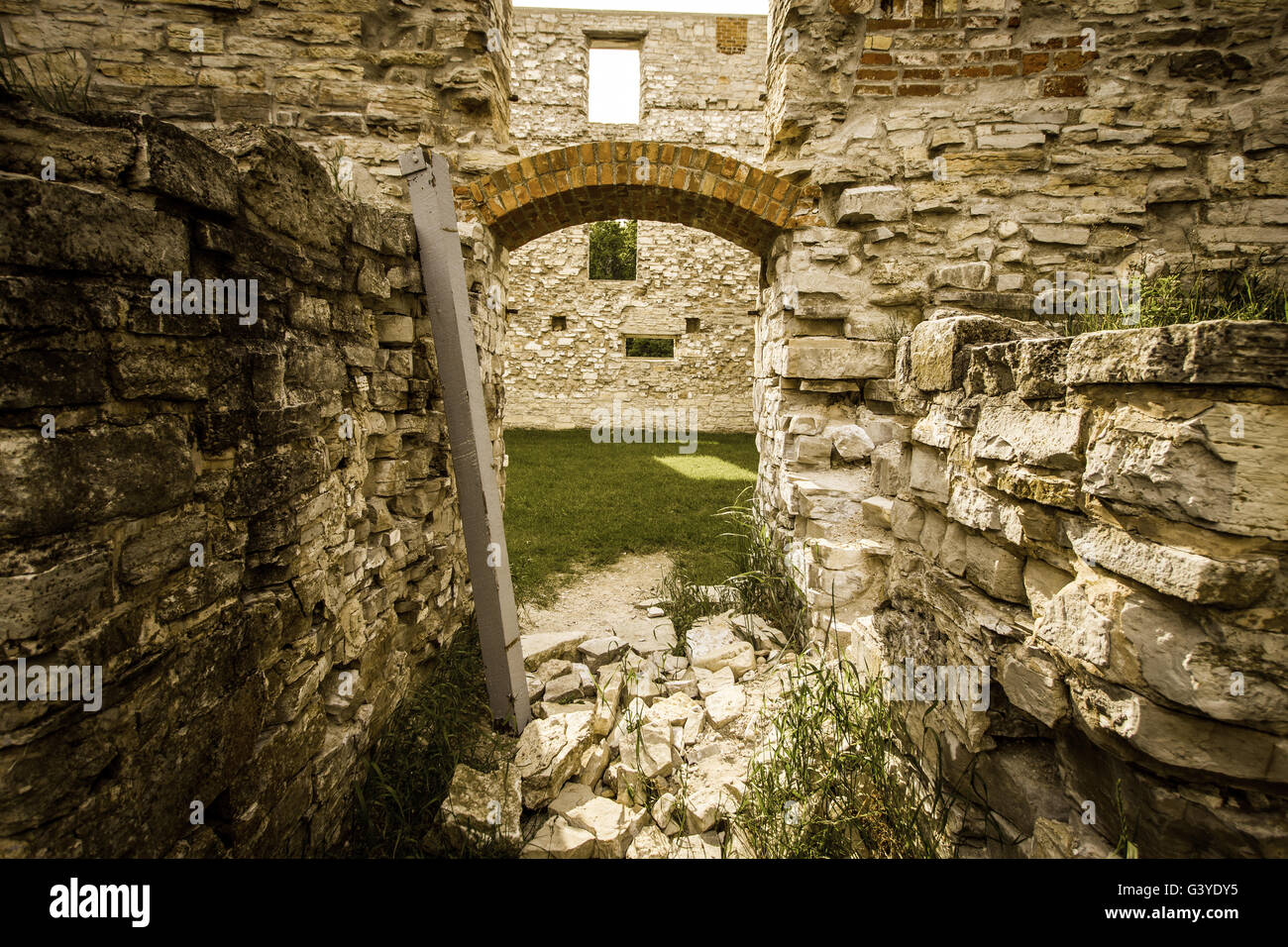 Crumbling wall of an abandoned building in the ghost town of Michigan's