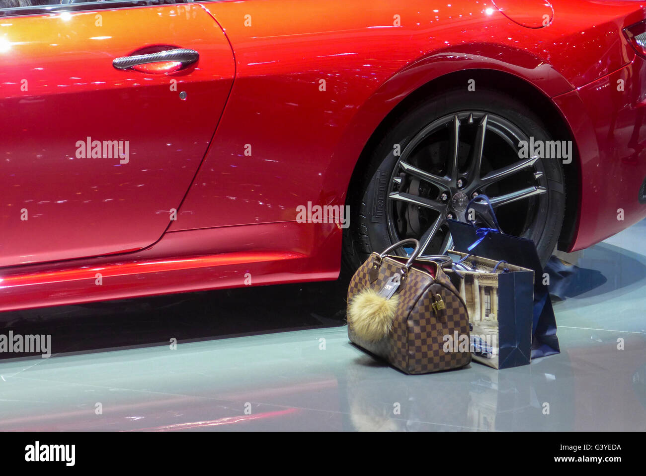 Maserati Car with womens shopping and handbag Stock Photo