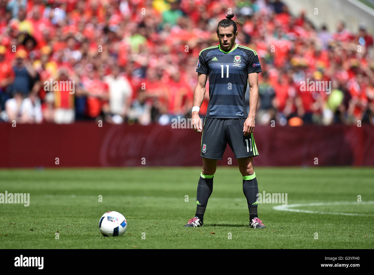 Wales' Gareth Bale prepares to take a free kick which he scores his sides  first goal of the game from during the UEFA Euro 2016, Group B match at the  Stade Felix