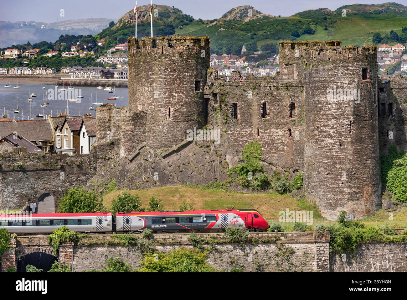 Conwy Castle Clwyd North Wales on the river Conwy. Conway Virgin Voyager  train. Stock Photo