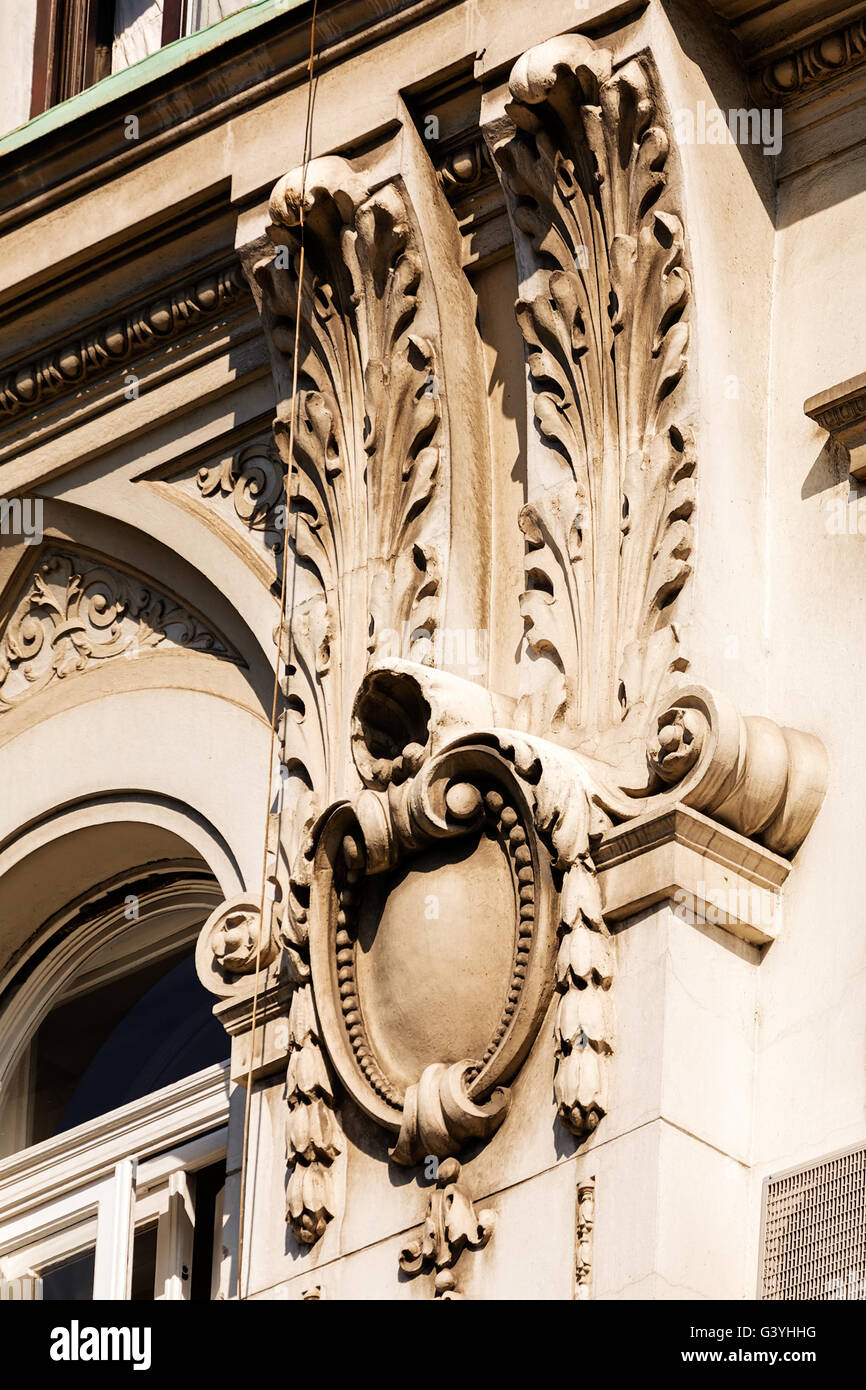 stone facade on classical building with ornaments and sculptures Stock ...