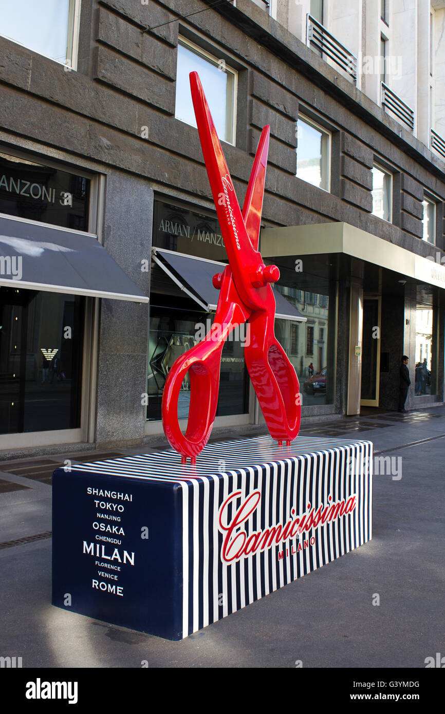 Camicissima fashion red scissors, as design sculture, in front of Armani  Hotel, in Via Alessandro Manzoni, Milano Stock Photo - Alamy