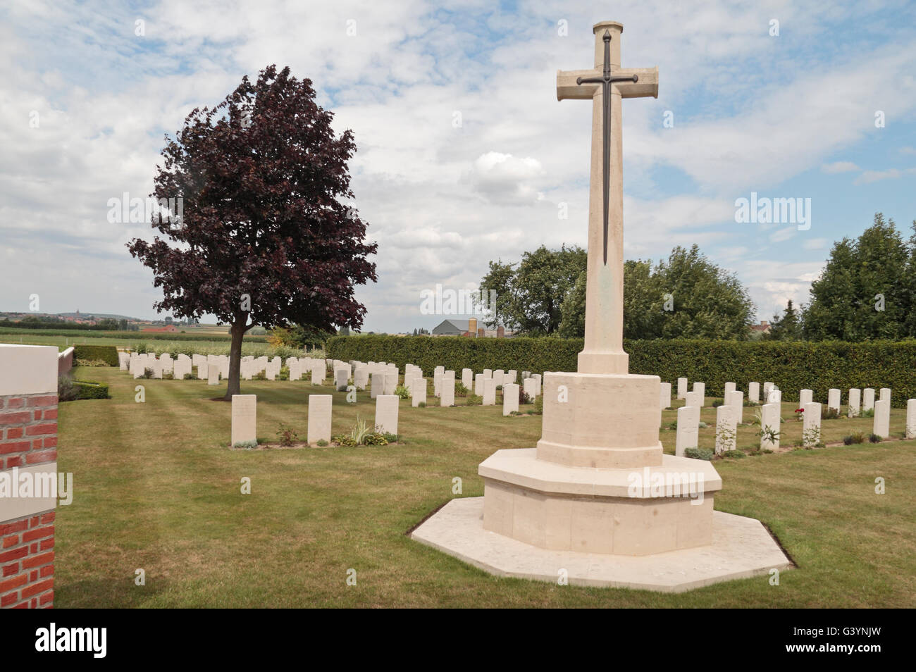 German (front) and Commonwealth (rear) headstones in the CWGC Maple Leaf Cemetery, Hainaut, Belgium. Stock Photo