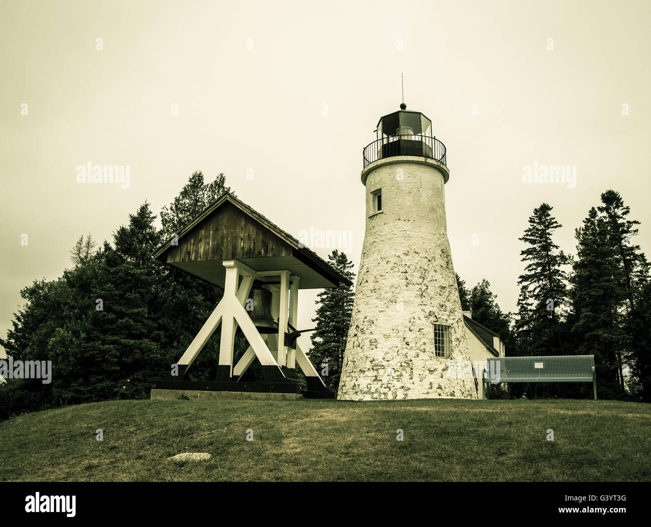 Old Presque Isle Lighthouse. Reportedly haunted lighthouse on the remote shores of Lake Huron. Stock Photo