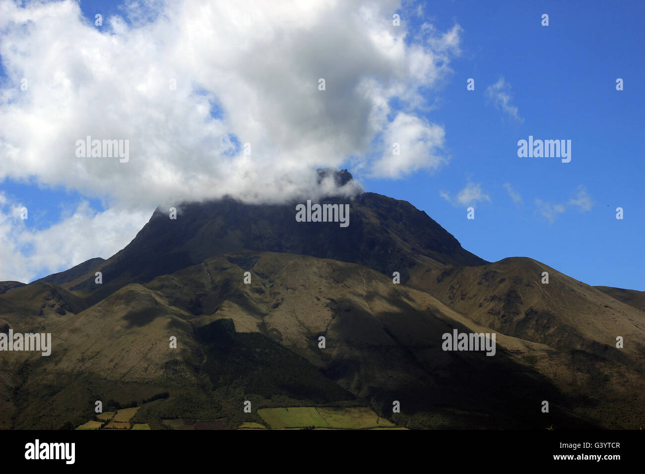 Clouds on the summit of the volcano, Mount Imbabura, in the Andes Mountains near Cotacachi, Ecuador Stock Photo