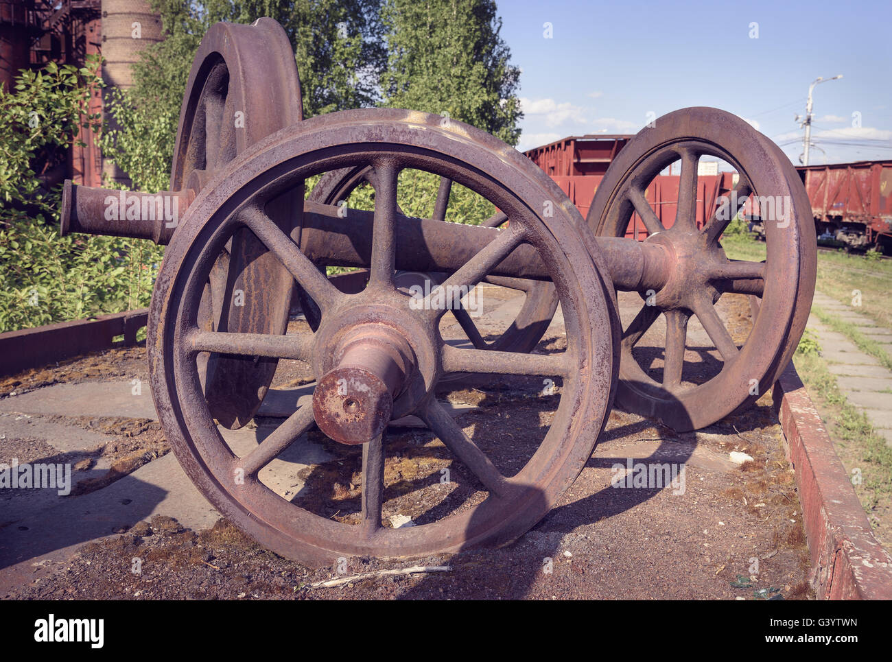 Old railcar wheelset. Old industrial railway cars on on Mining and metallurgical plant Stock Photo