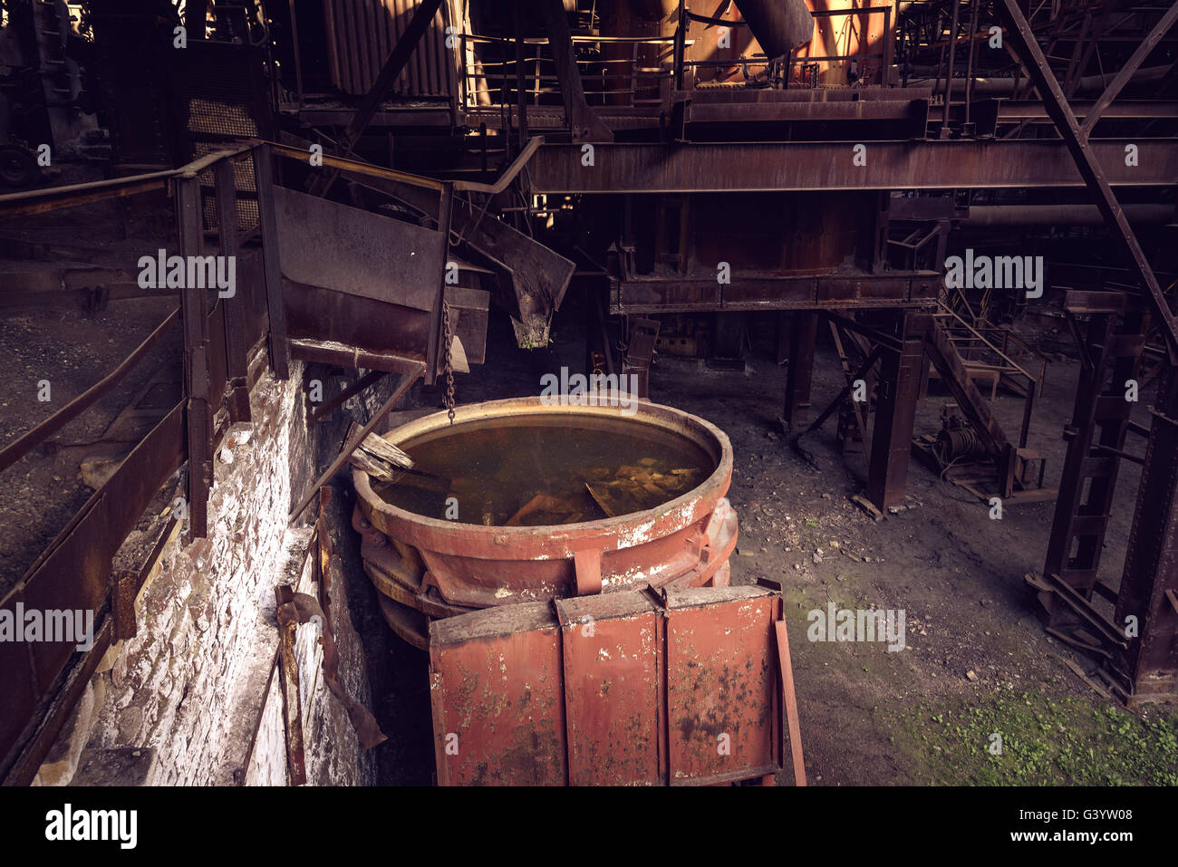 Old slag disposal pots, mounted on railway platforms in blast furnace  workshop on Mining and metallurgical plant Stock Photo - Alamy