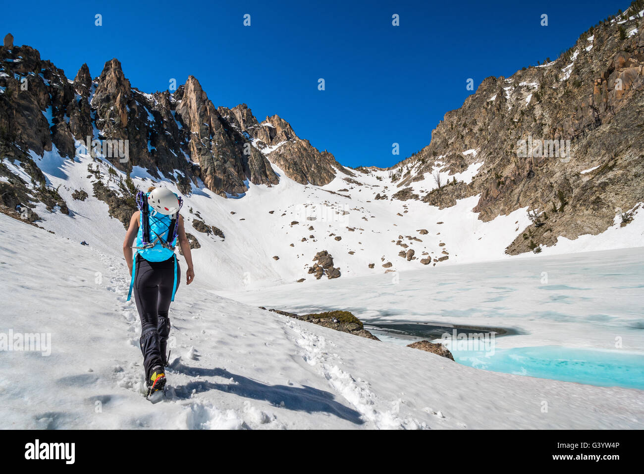 Noelle Synder on route to climb Mount Heyburn in the Sawtooth Mountain Range Stock Photo
