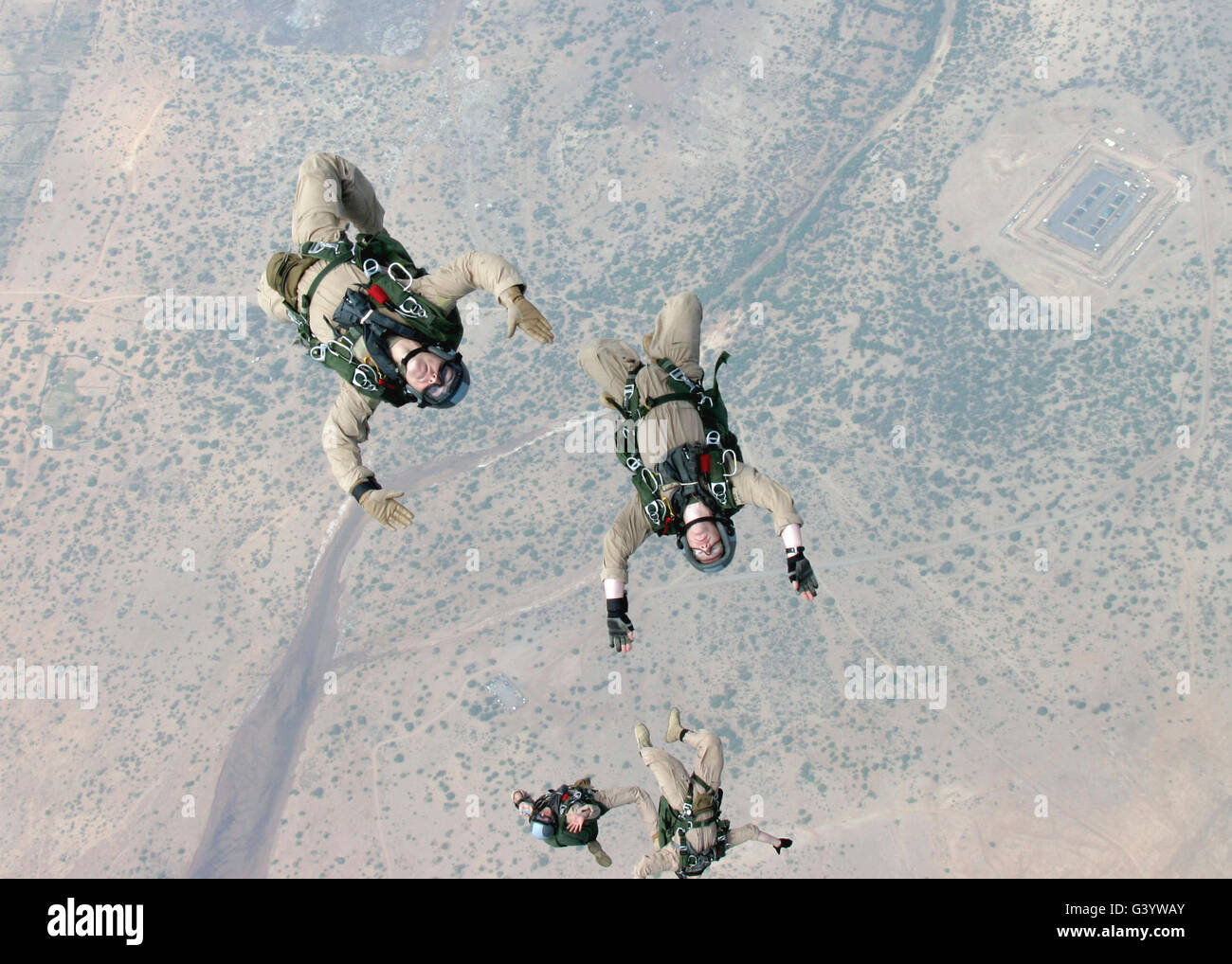 Marines freefall over Djibouti, Africa, during parachute training. Stock Photo
