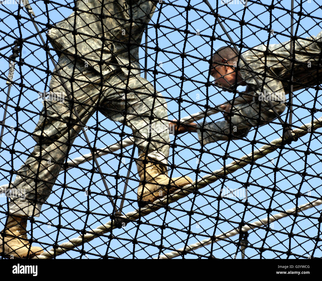 U.S. Army privates compete in the victory tower course during Army basic training. Stock Photo