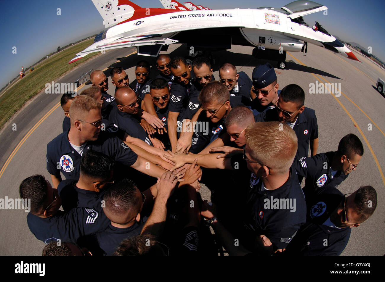 Air Force Thunderbird maintainers bring it in for a cheer. Stock Photo