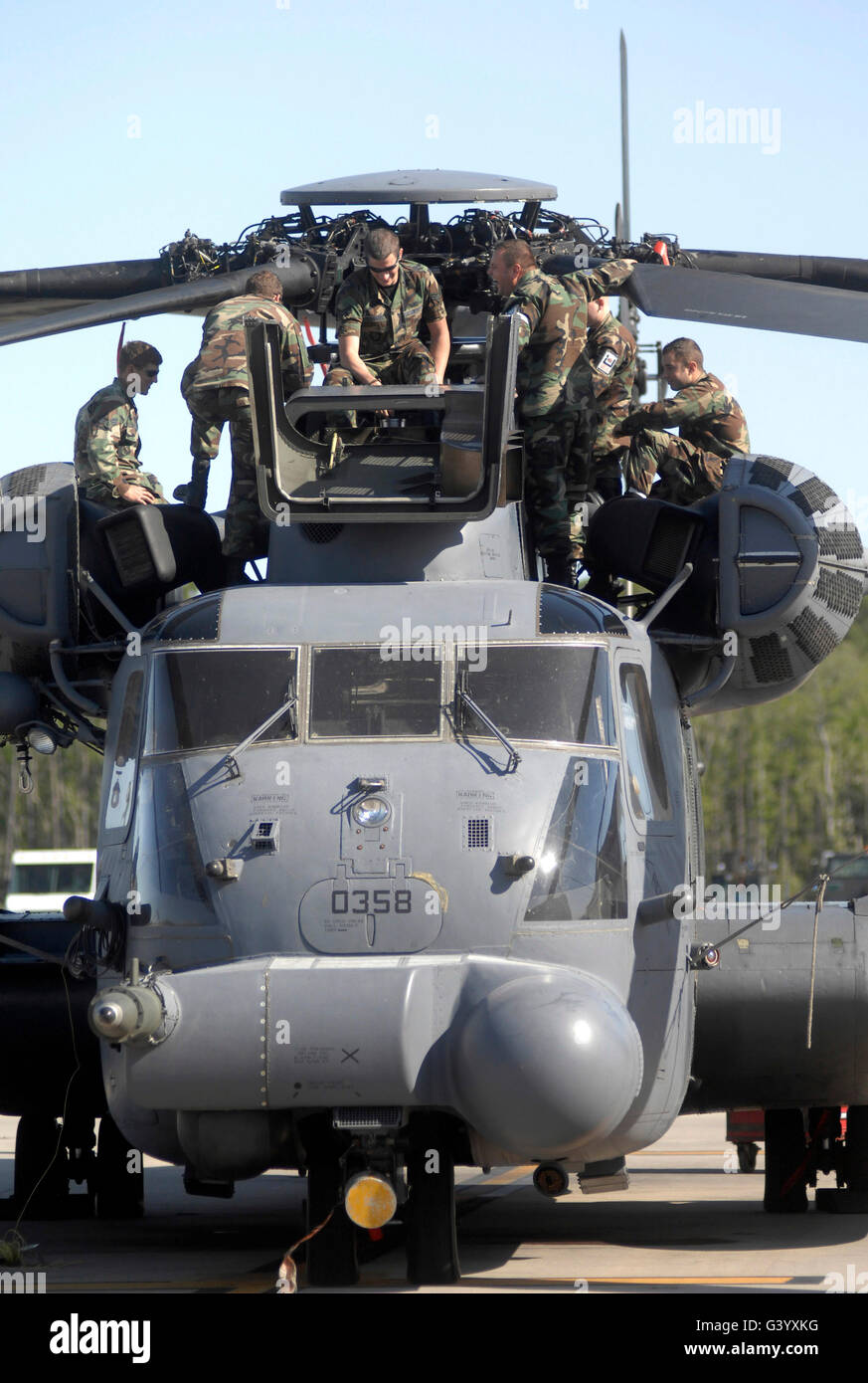 Airmen conduct training on the MH-53 Pave Low. Stock Photo