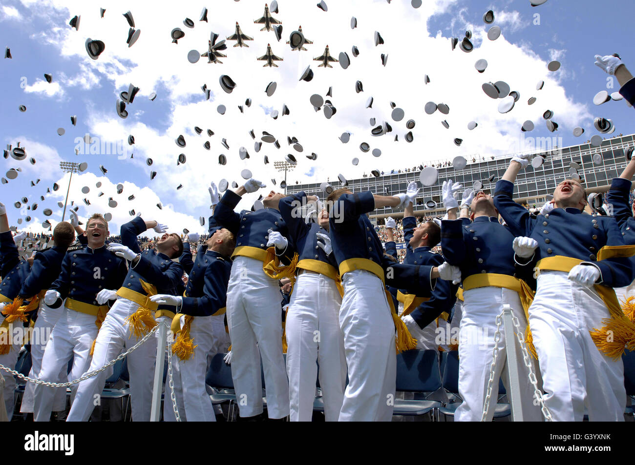 The U.S. Air Force Thunderbirds fly over the 2007 U.S. Air Force Academy graduation ceremony. Stock Photo