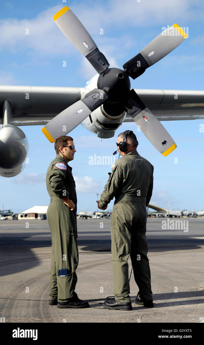 Personnel conduct a pre-flight briefing. Stock Photo