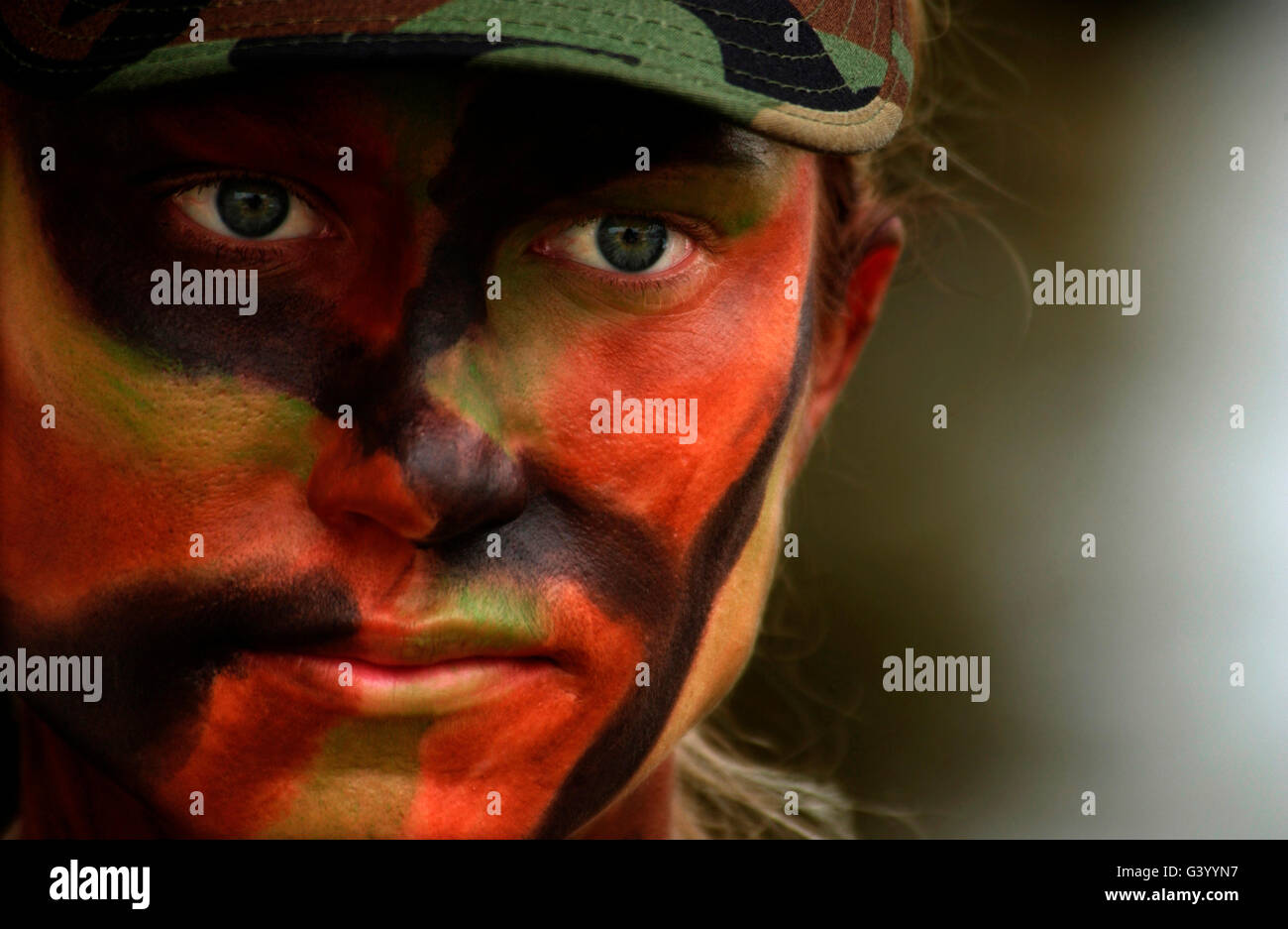 Close-up of U.S. Air Force soldier with camouflage face paint. Stock Photo