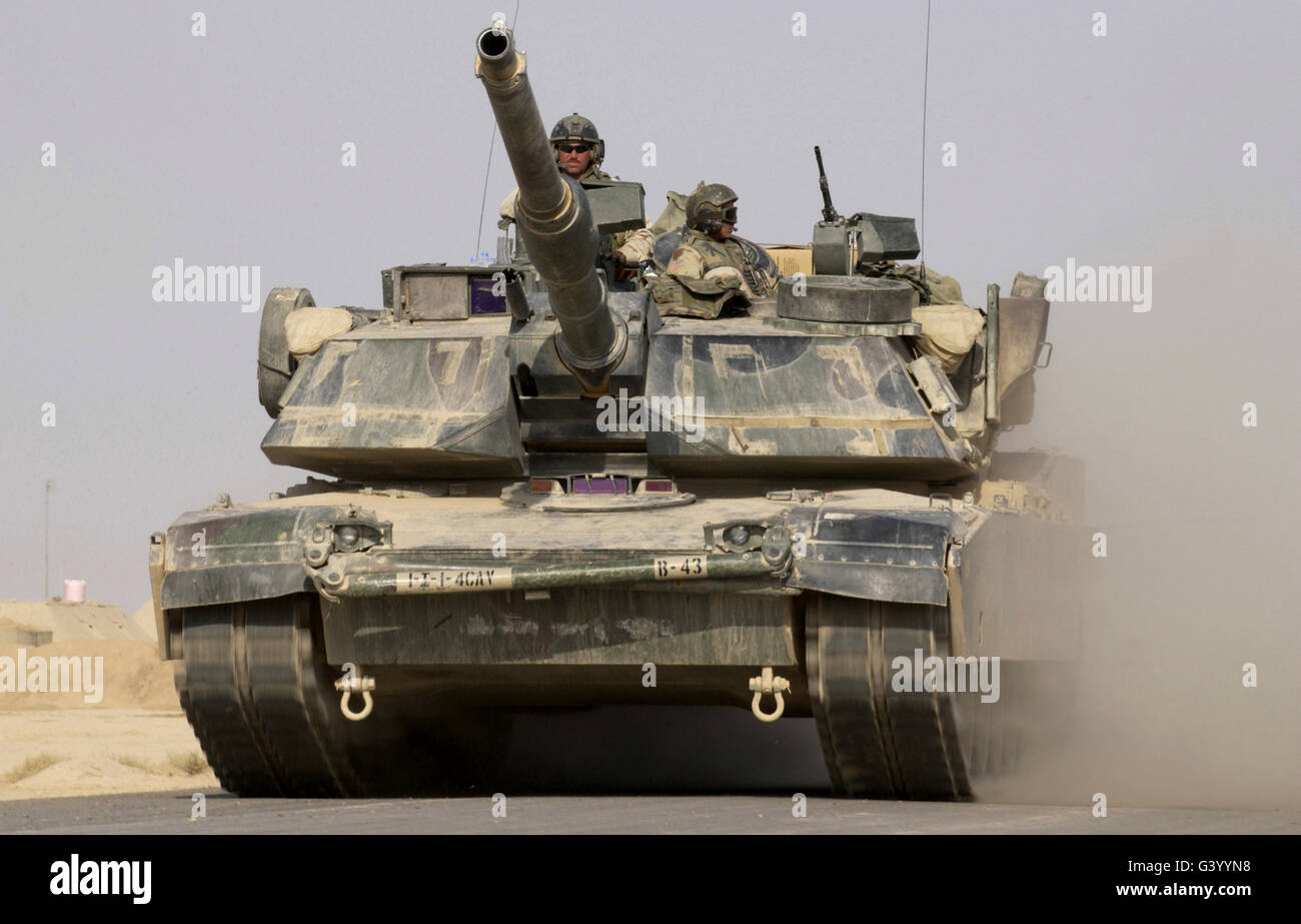 An M1A1 Abrams tank heading out on a mission from Forward Operating Base MacKenzie in Iraq. Stock Photo