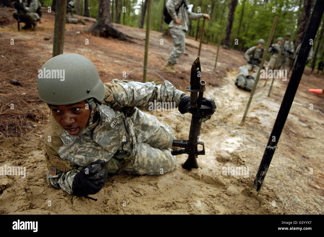 A U.S. Army recruit negotiating the confidence course during basic combat training at Fort Jackson, South Carolina. Stock Photo