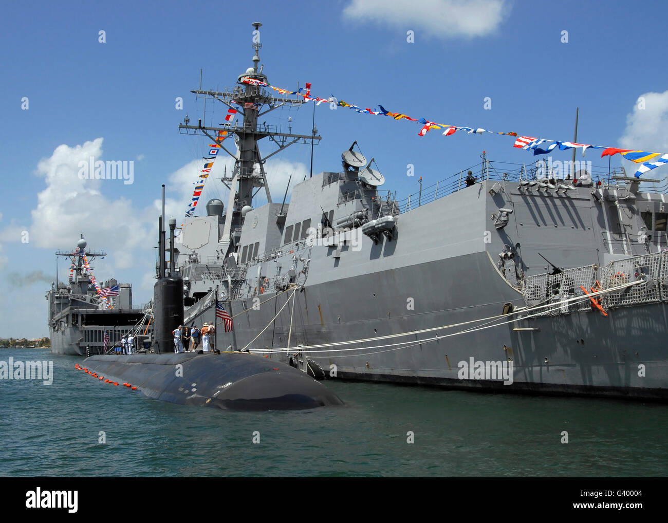 Attack submarine USS Toledo moored next to the guided-missile destroyer USS Forrest Sherman. Stock Photo