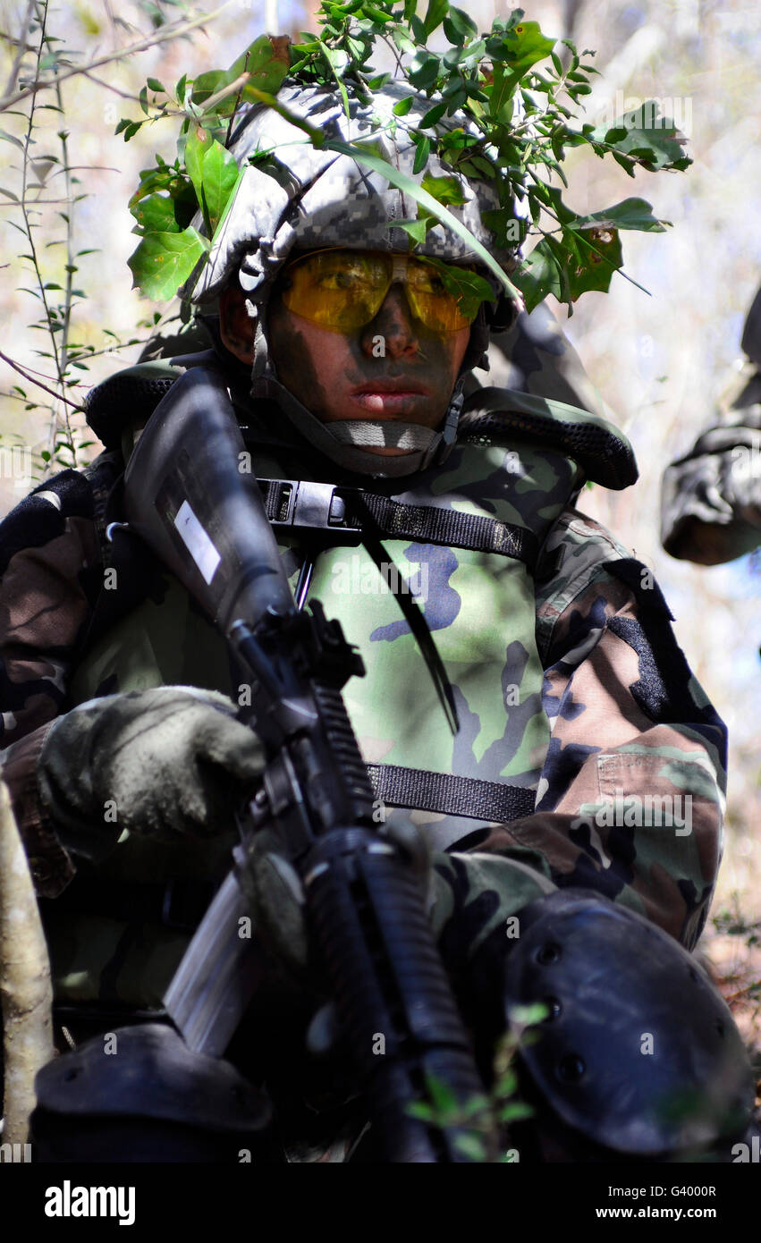 Soldier in camouflage during a field training exercise. Stock Photo