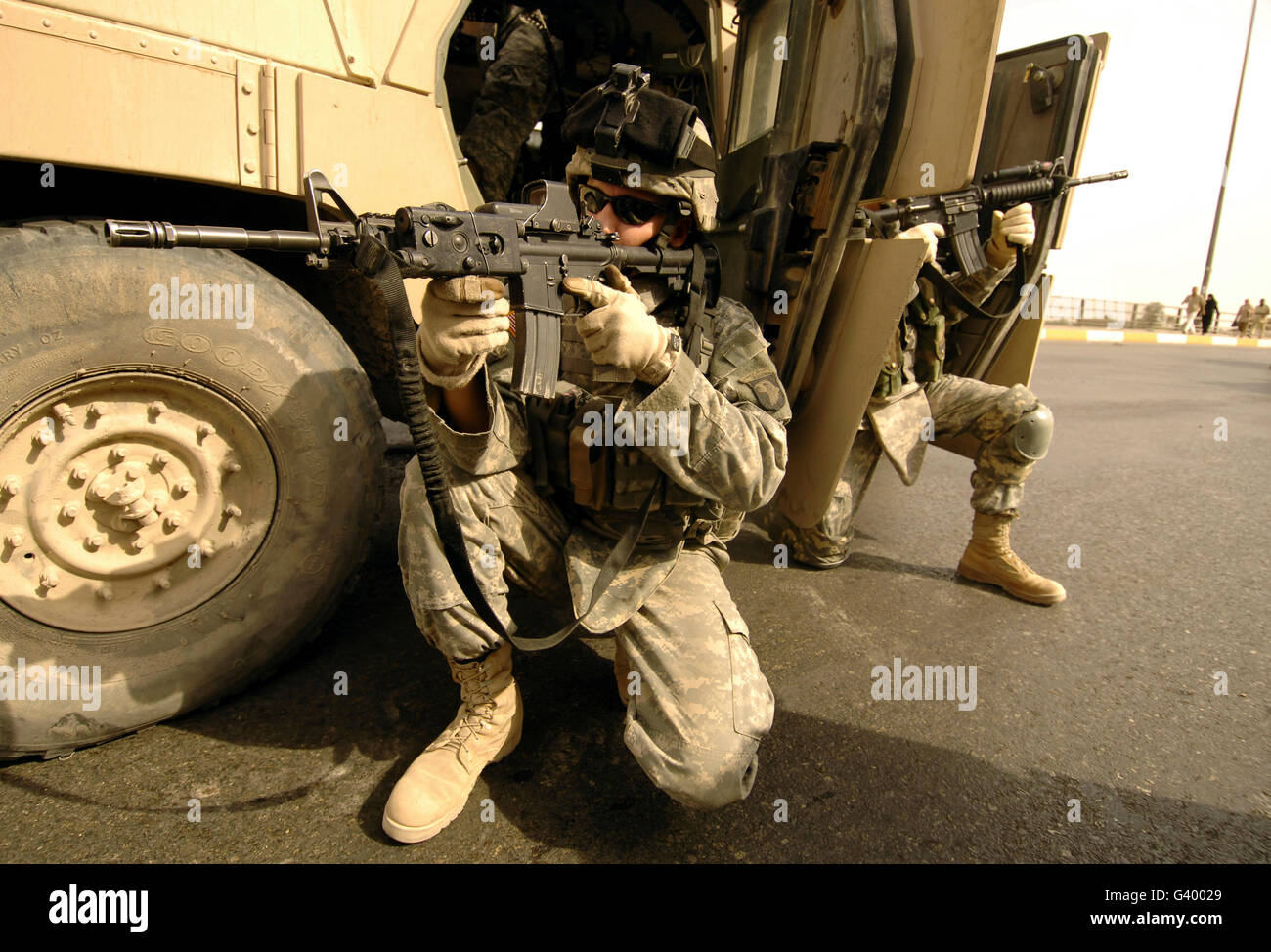 U.S. Army soldiers providing overwatch security in northeast Baghdad, Iraq. Stock Photo