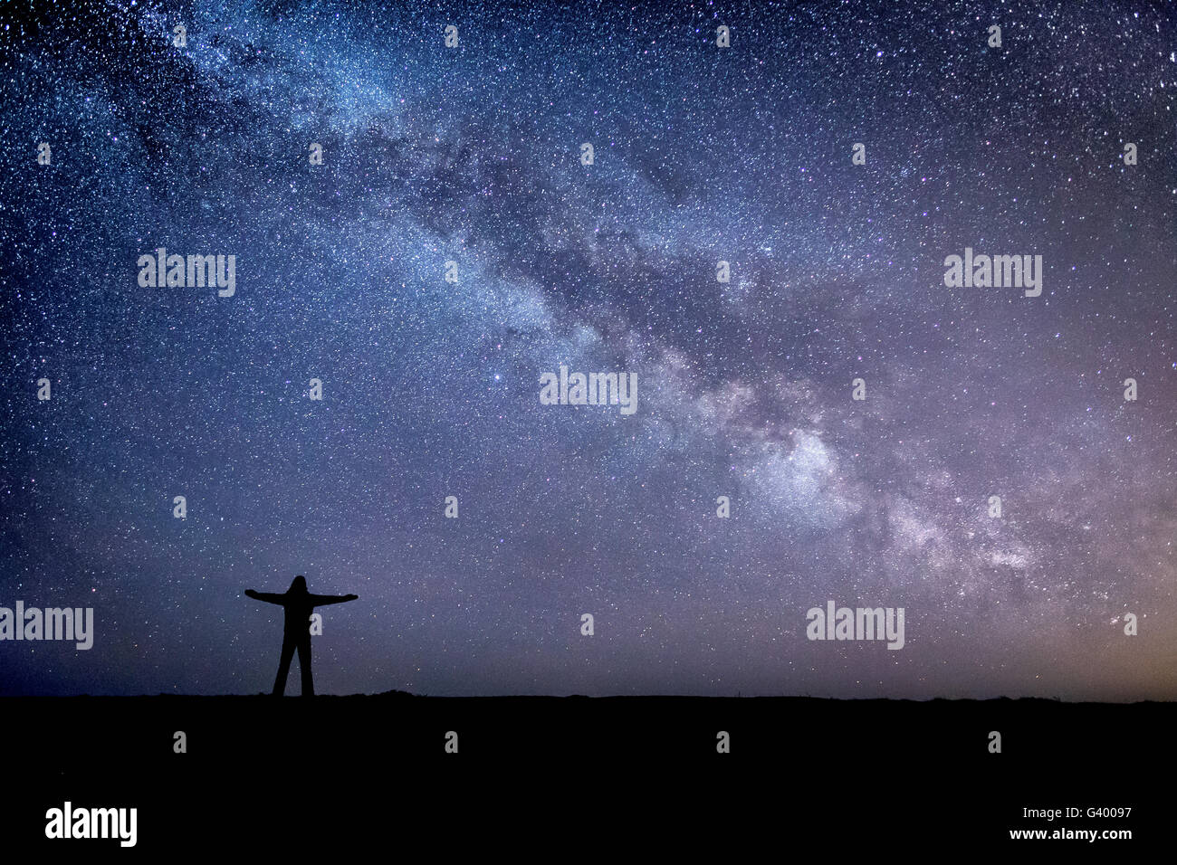 Space is THIS big ! A self portrait from a night spent star gazing at Dunstanburgh Castle in Northumberland UK. Stock Photo