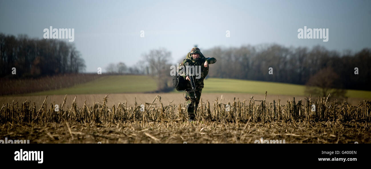 French Foreign Legion moves to assigned position after parachuting down north of Tarbes, France, 11 December 2007 Stock Photo