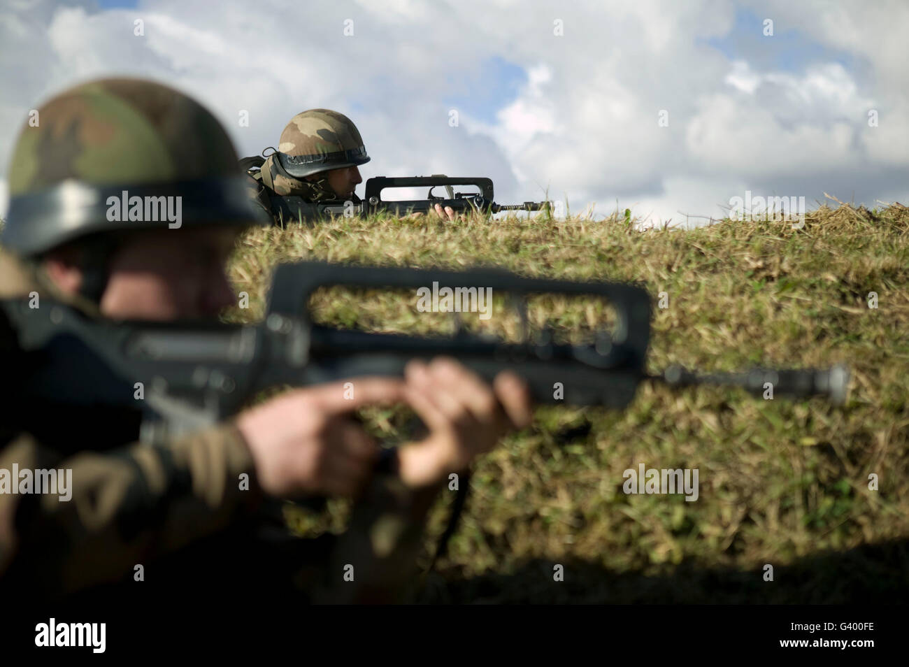 Members of the French Foreign Legion hold their positions during a full scale multi-force exercise held at the airport of Tarbes Stock Photo