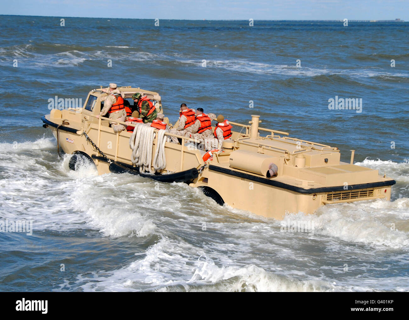 A Lighter Amphibious Resupply Cargo vehicle returns to sea after unloading supplies. Stock Photo