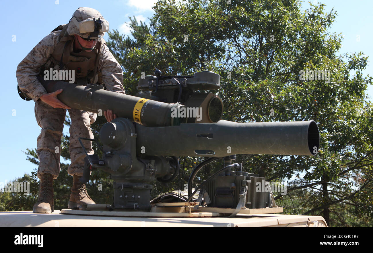 A missileman loads a TOW missile into the M41A1 Saber System. Stock Photo