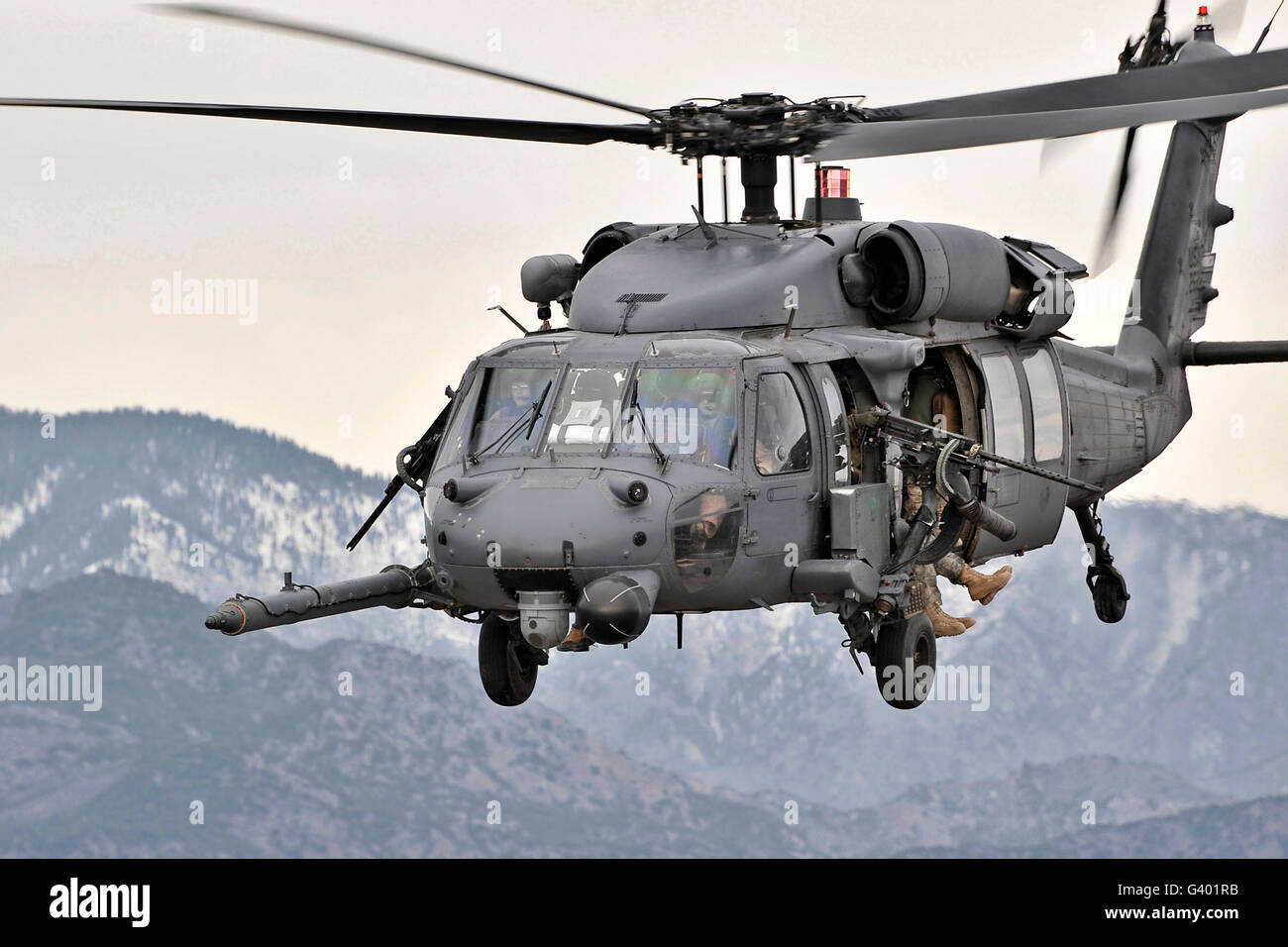 An HH-60 Pave Hawk helicopter in flight over Afghanistan. Stock Photo
