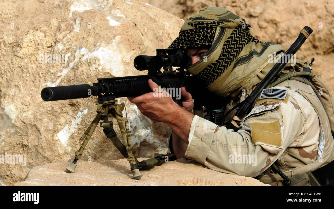 A U.S. Special Forces soldier armed with a Mk-12 Sniper Rifle. Stock Photo