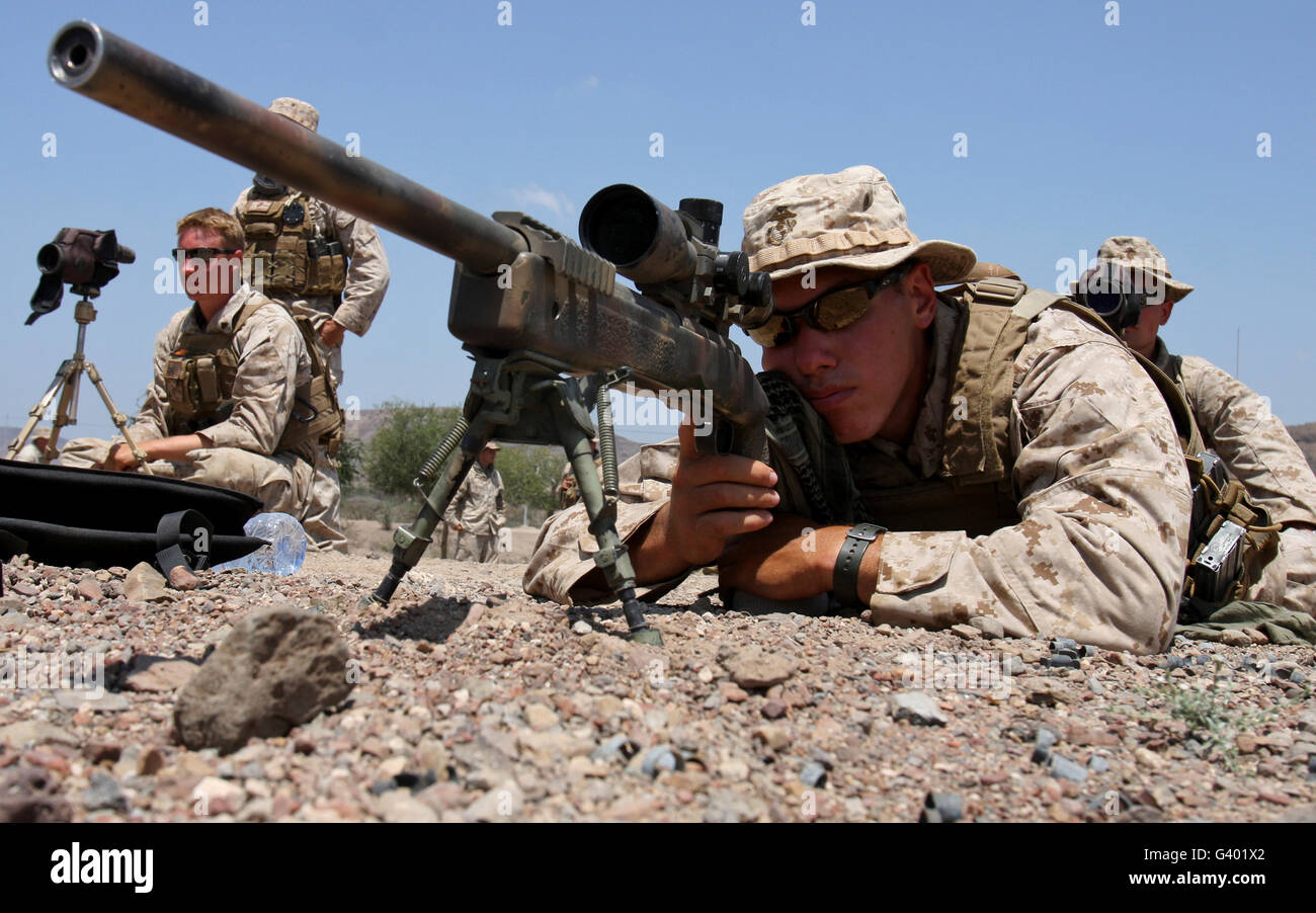 U.S. Marine fires his M40sniper rifle. Stock Photo