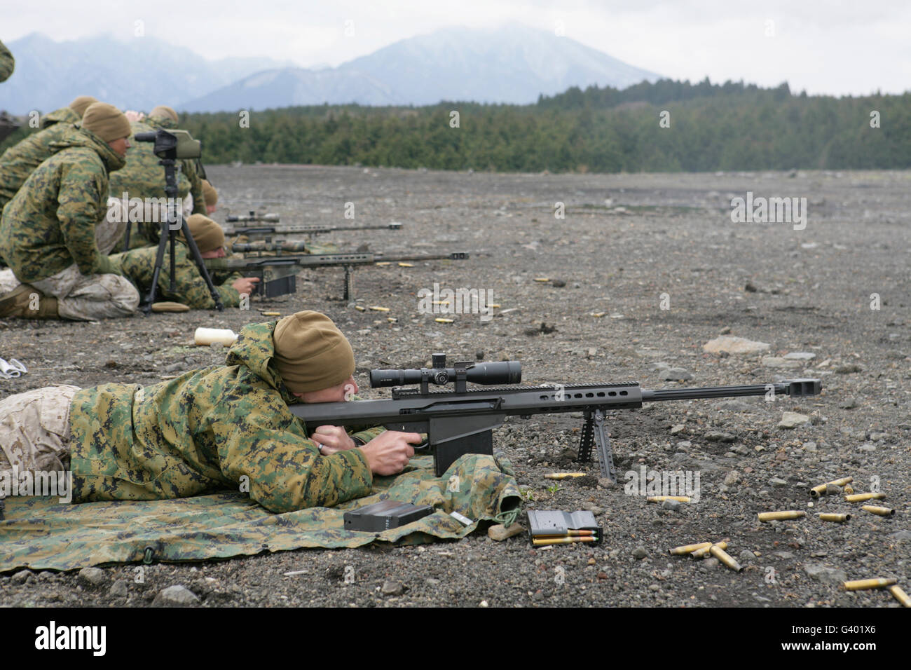 U.S. Marines fire an M107 special application scoped rifle at Camp Fuji, Japan. Stock Photo