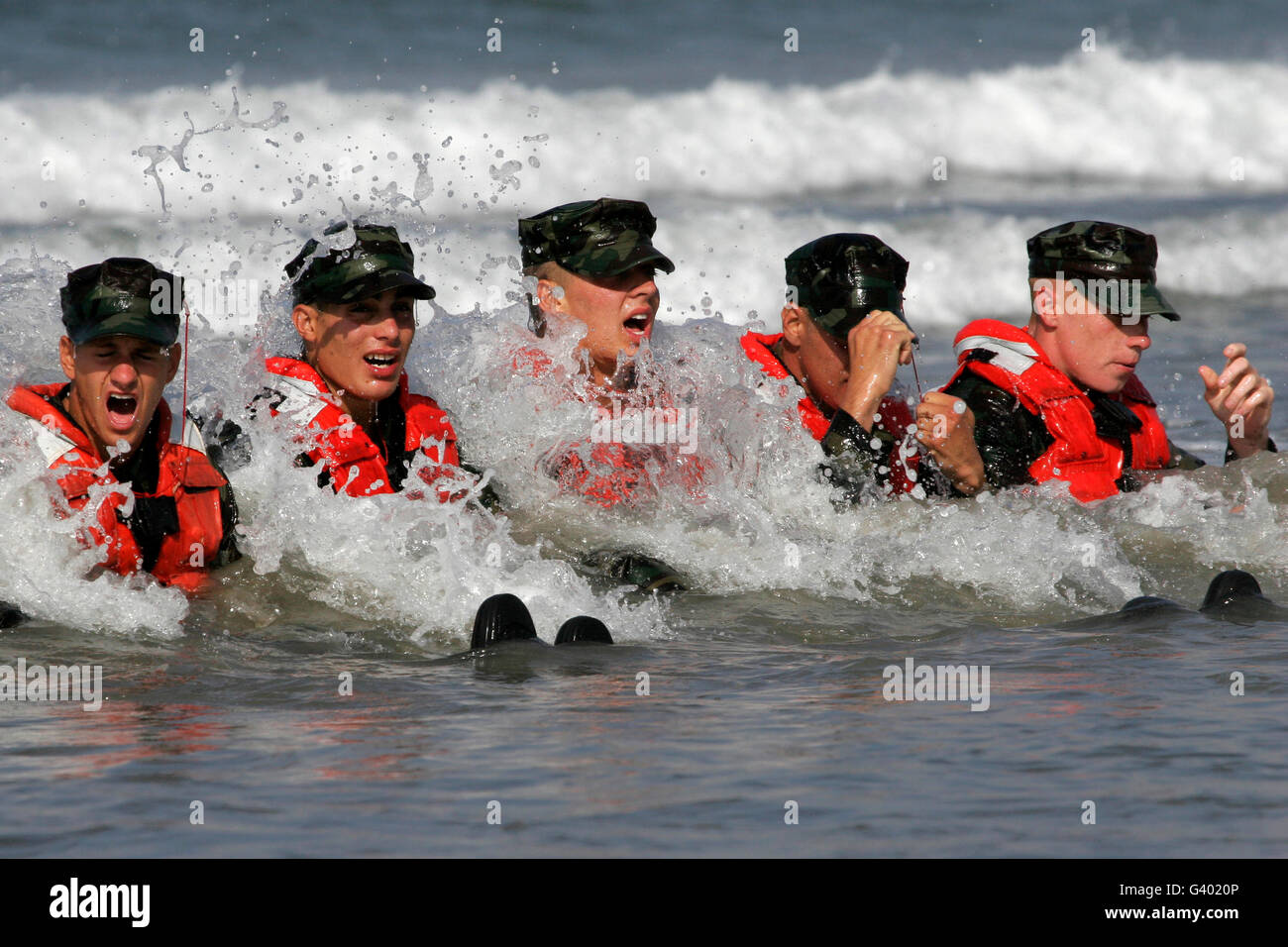 BUD/S students participate in a surf passage exercise. Stock Photo