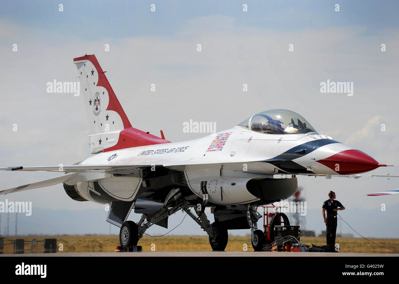 Preflight checks are performed on a U.S. Air Force Thunderbirds aircraft. Stock Photo