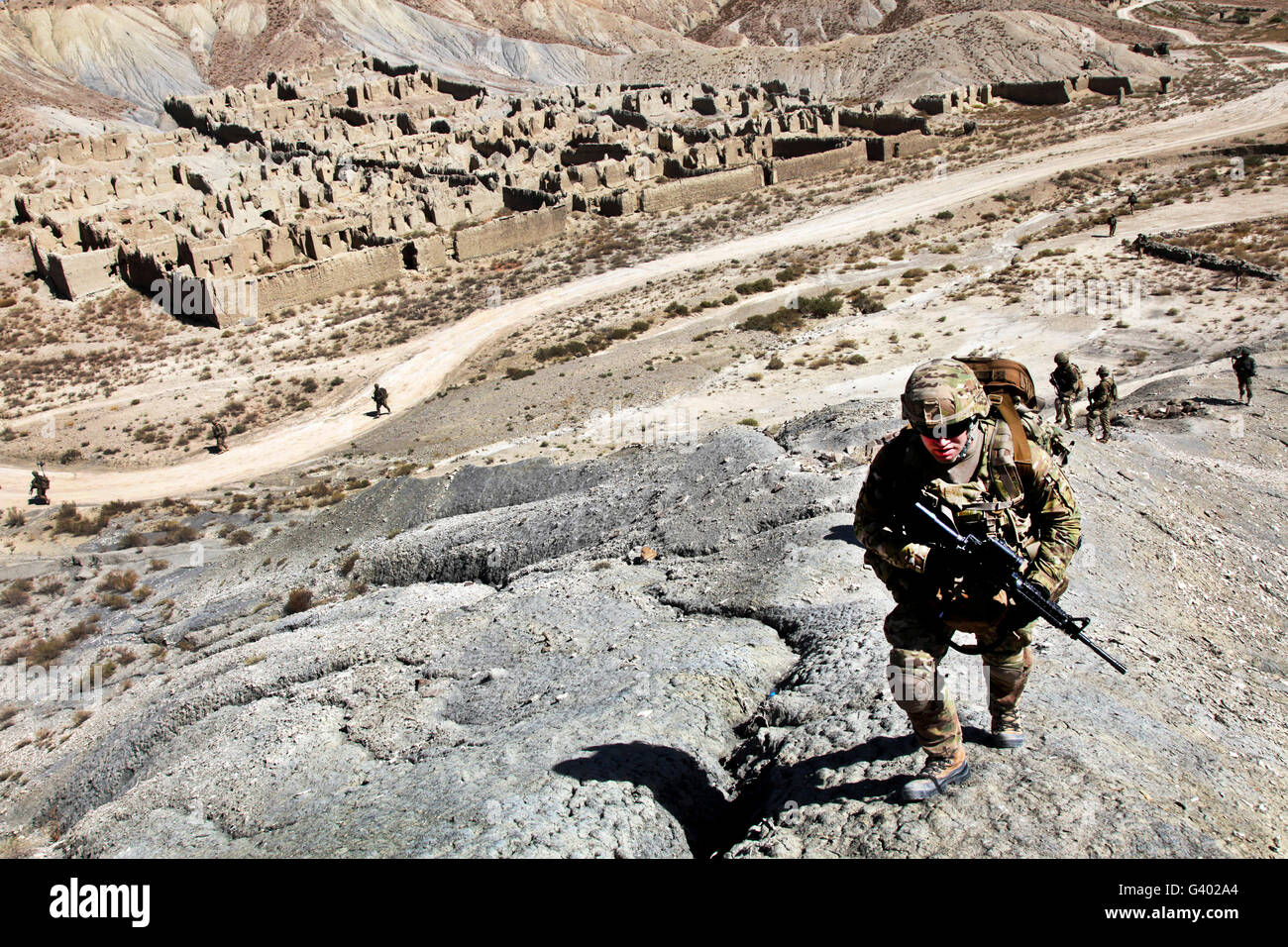 U.S. Army soldiers and Afghan Border Patrolmen provide security  in Afghanistan. Stock Photo