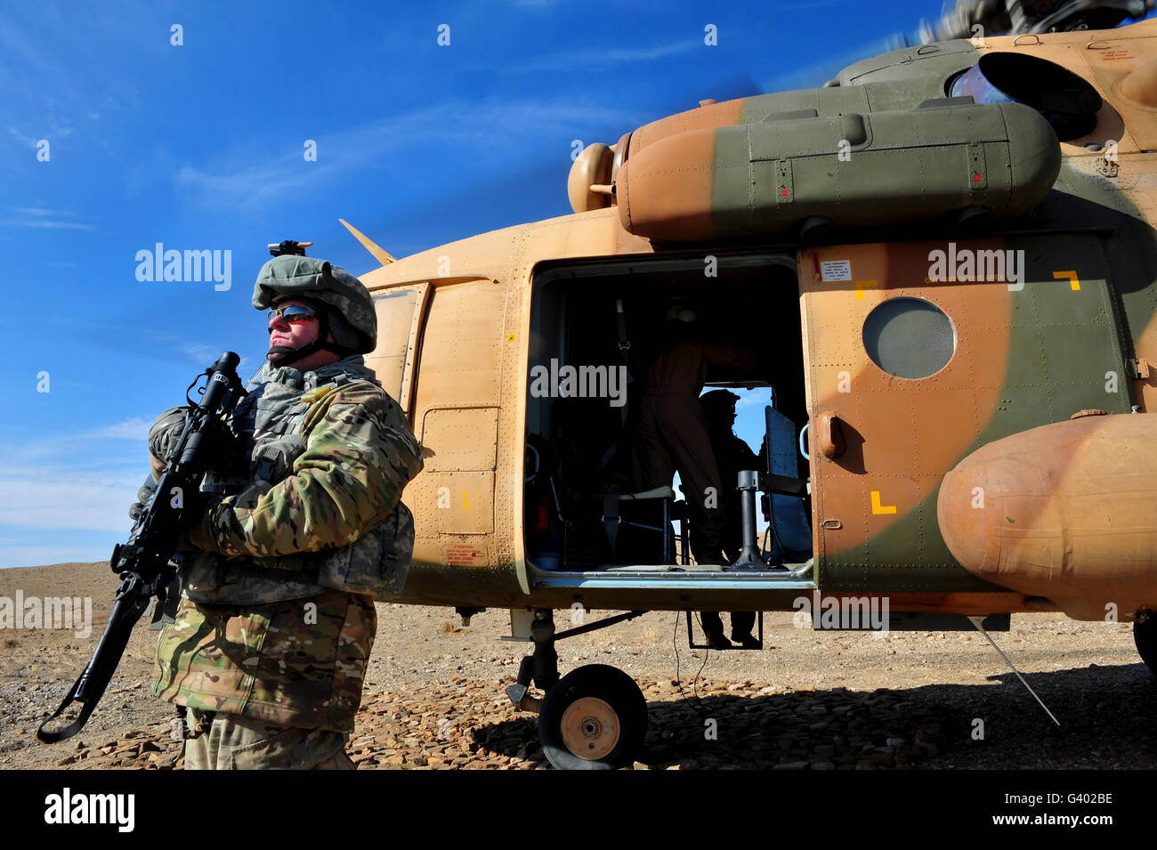 A security forces airman covers his sector in western Afghanistan. Stock Photo