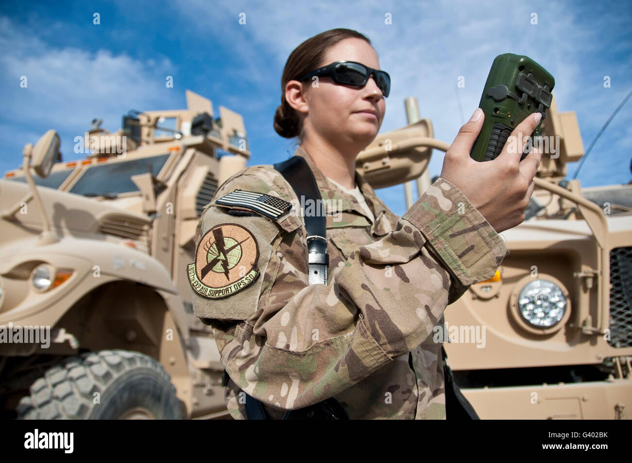 Air Force Captain looks at a Defense Advanced GPS Receiver. Stock Photo