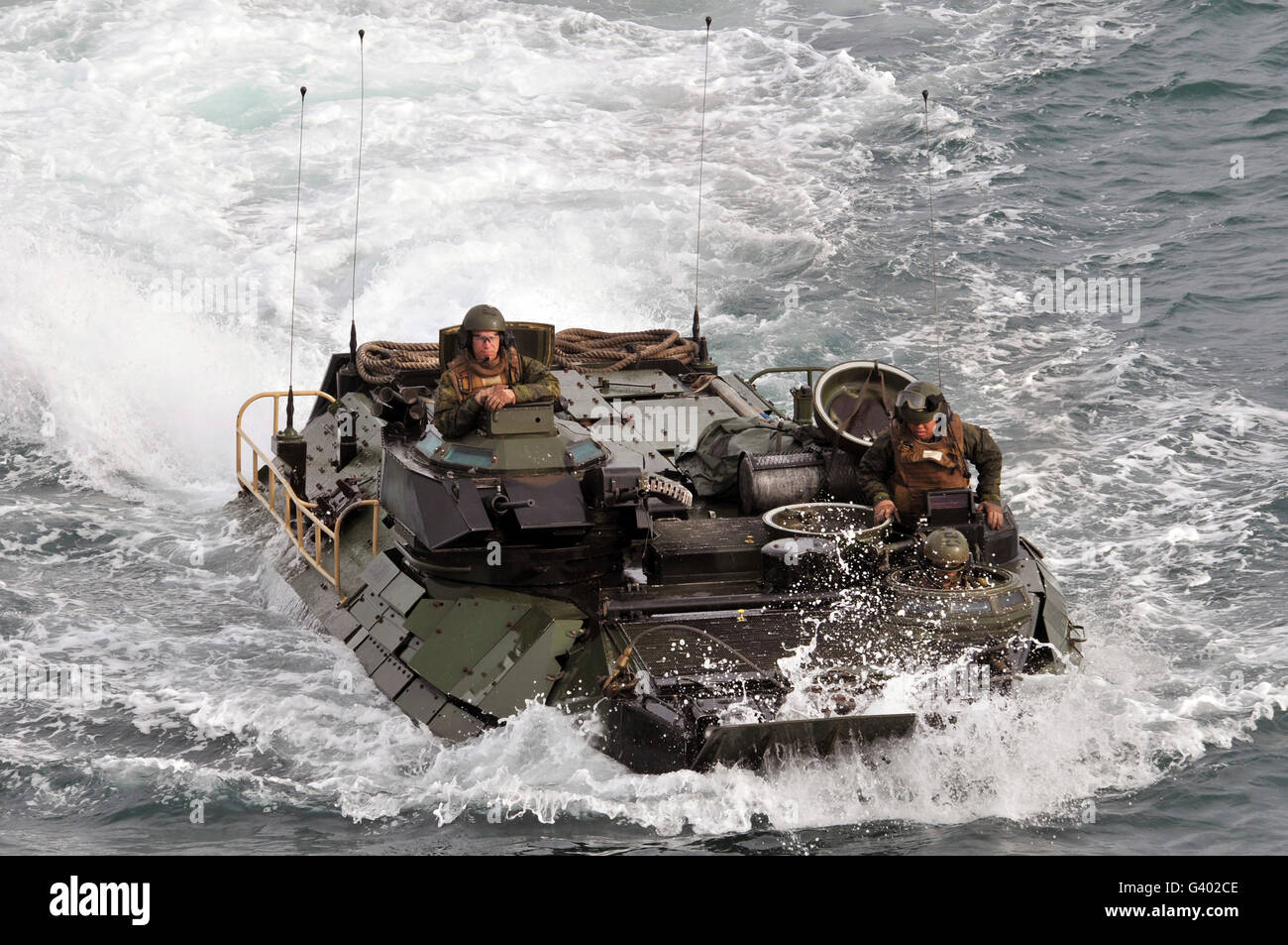 An amphibious assault vehicle approaches the well deck of USS Kearsarge. Stock Photo