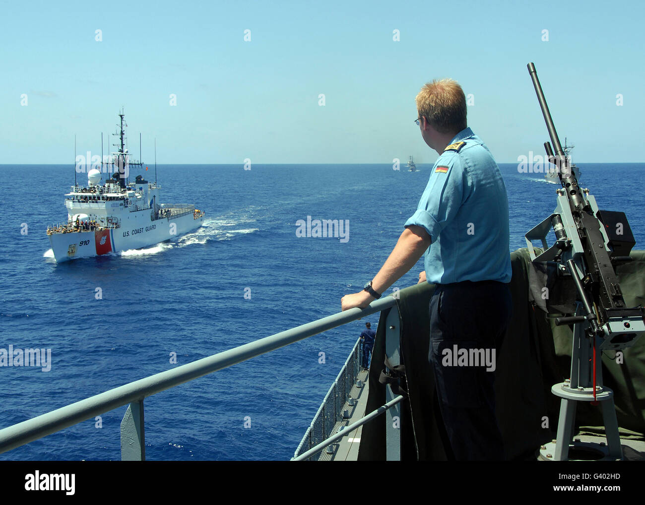 USCGC Thetis approaches a German combat support ship. Stock Photo