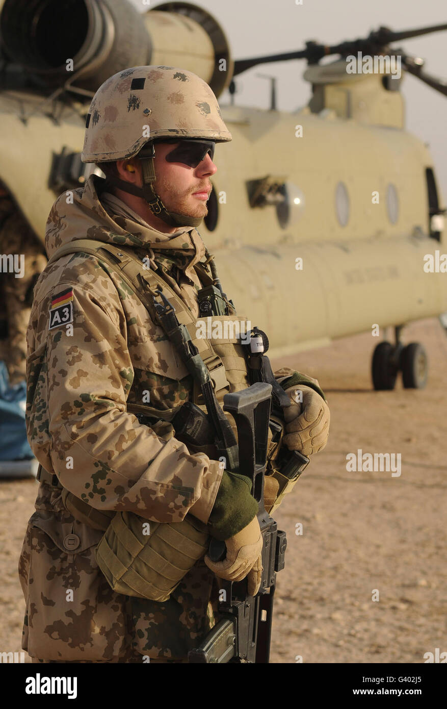 A German soldier scans the horizon while standing guard Stock Photo - Alamy